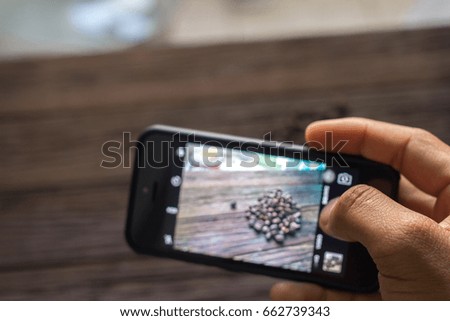 take photo a coffee beans with smartphone
