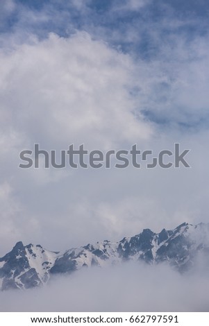 Low clouds on the mountain peaks, Kazakhstan, Kyrgyzstan