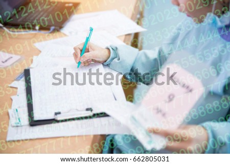 Double exposure image Of a female dentist holding a pen(soft focus)