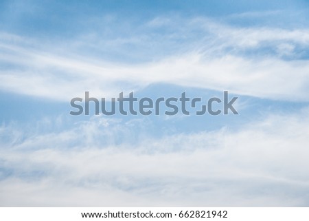 Blue sky  with tiny clouds background