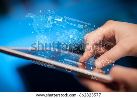 Female hands touching tablet with maps and charts 