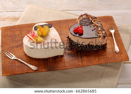 Delicious strawberry cake in shape of heart with Happy Fathers Day inscription greetings

