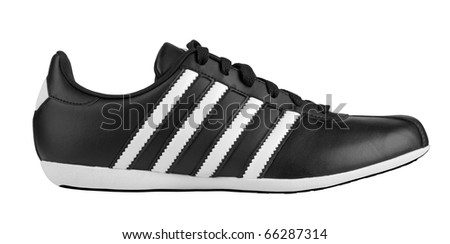 Black sneaker with white strips isolated on white background