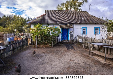 House in Kupovate settlement of so called Samosely - residents of Chernobyl Exclusion Zone, Ukraine Royalty-Free Stock Photo #662899645