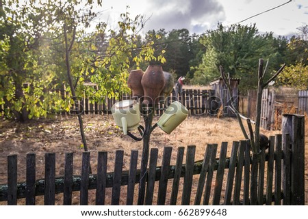 Farm in Kupovate settlement of so called Samosely - residents of Chernobyl Exclusion Zone, Ukraine Royalty-Free Stock Photo #662899648