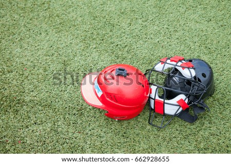 Softball equipment sports on grass field