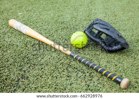 Softball equipment sports on grass field