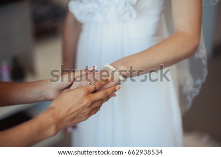 Bracelet on the bride's hand