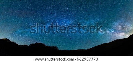 Night panoramic photography: The Milky Way over Pyrenees within Vall de Boí, Catalunya, Spain