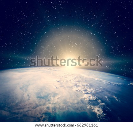 Earth and space. Dramatic sunrise. "The elements of this image furnished by NASA"