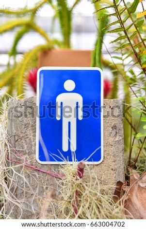 Sign for man toilet bathroom / Toilet Icon Sign on blue background outdoors bathroom 
