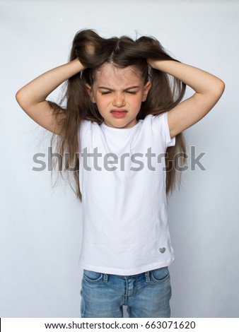little angry girl, isolated on a white background