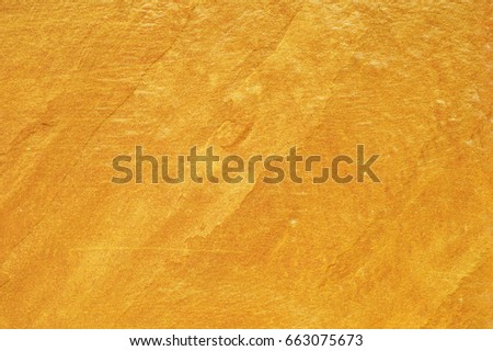 Golden Concrete wall texture for text and background.Overlay Gold Textures Concept