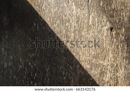 Grey brown background created from picture of wooden plank surface.
