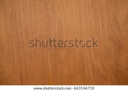Red brown orange background created from picture of wooden wall and door surface.
