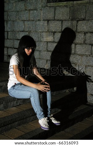 A Chinese girl who is very sad at night
