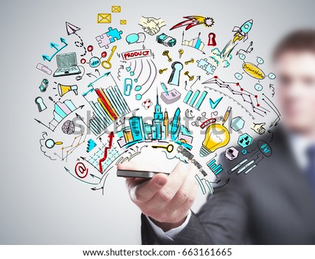 Businessman holding smartphone with abstract business sketch. Communication concept