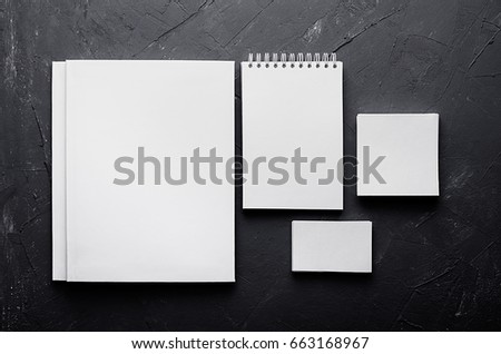 Blank stationery on elegant dark grey concrete texture. Corporate identity template. Mock up for branding, graphic designers presentations and portfolios. Top view.