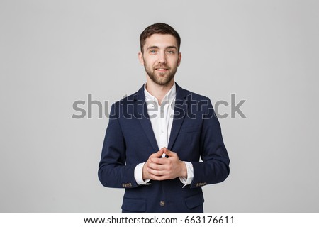 Business Concept - Portrait Handsome Business man holding hands with confident face. White Background. Royalty-Free Stock Photo #663176611