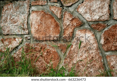 Gray brown stone wall background 