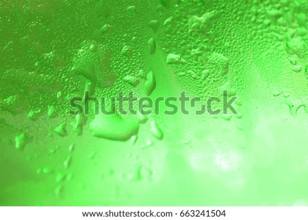 water drops on plastic bottle background close up