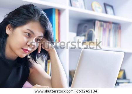 Business Woman Working on Laptop in the Office