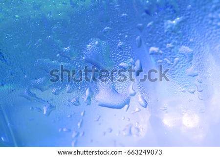 water drops on plastic bottle background close up