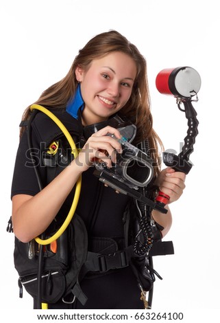 Beautiful woman scuba diver  with photocamera on a white background.