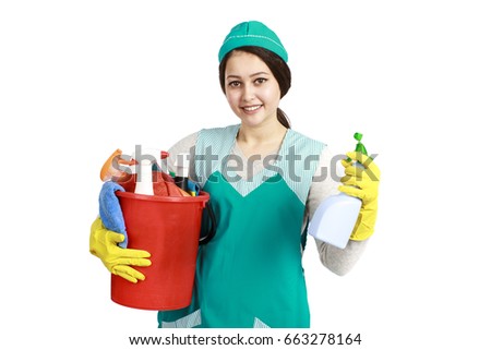 Young asian brunette woman holding cleaning tools and products in bucket, isolated on white background
