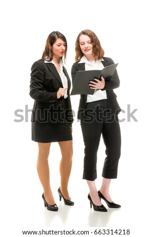 Two young business women in full li