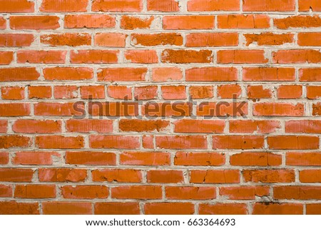 The texture of the old brick wall of the orahian color