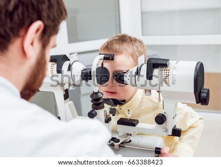 Synoptophore. Strabismus treatment. Squint test. Orthoptics. Doctor performs strabismus checkup. Royalty-Free Stock Photo #663388423