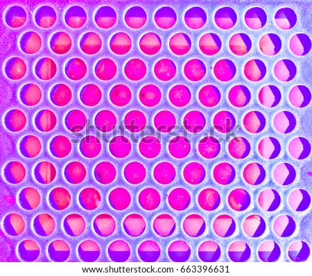 Background of colorful plastic holes