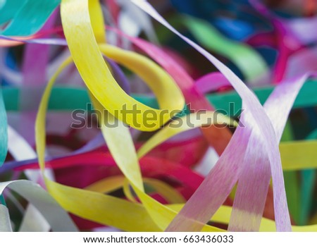 Multicolored confetti. Serpentine. Selective focus, abstract image.