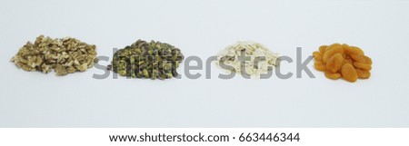 Dried   pistachio, apricot, nut and  almond sliced  isolated on white background