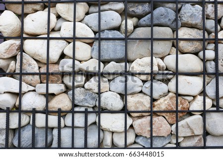 Background, Granite retaining wall reinforced with steel grid