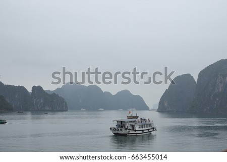 Ha Long Bay in a foggy and gloomy afternoon - Vietnam