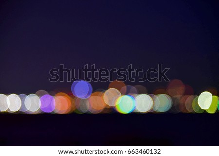 Colorful light bokeh with night background.