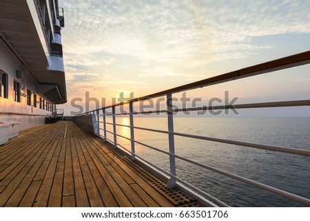 Cruise ship deck with beautiful sunset. Royalty-Free Stock Photo #663501706