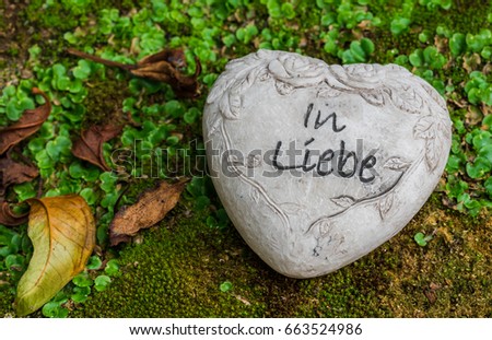 Mourning heart with German text In Liebe - means In Love.