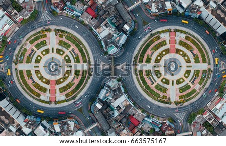 The road roundabout at morning and the city in Bangkok, Thailand. Aerial view. Top view. Background scenic road.