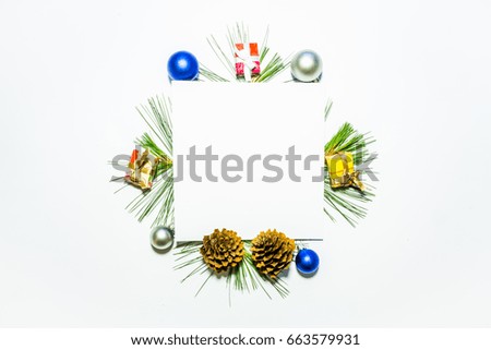 X-mas background with christmas balls, presents, pinecones and green pine leaves. Square copy space for text