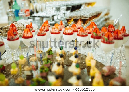  Wedding Candy Bar. Delicious sweet buffet with cupcakes. Sweet holiday buffet with cupcakes and other desserts.