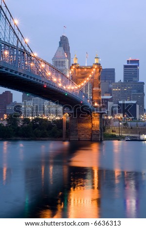 Cincinnati skyline and Roebling Suspension Bridge shortly before sunrise.