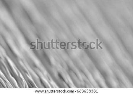 Abstract blur background with deep grooves in the texture of corrugated paper