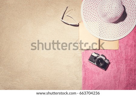 Top view photograph of sandy beach. Frame composition. Vintage effect background with copy space. Frame for advertising or concepts