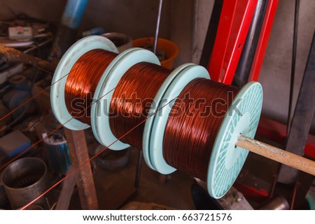 Copper wire is used for many different sizes of motor  in a repair shop.