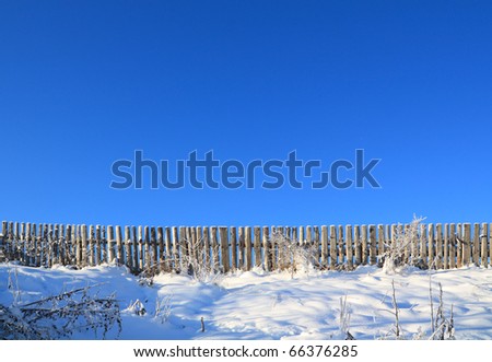 old fence on celestial background