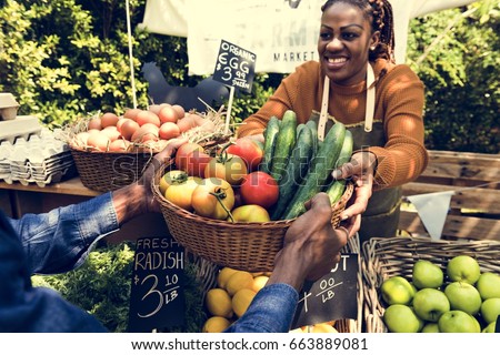 Woman Selling Fresh Local Vegetable at Farmers Market