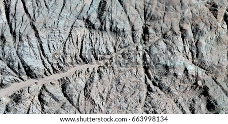 long and hard road, abstract photography of the deserts of Africa from the air. aerial view of desert landscapes, Genre: Abstract Naturalism, from the abstract to the figurative,contemporary photo art